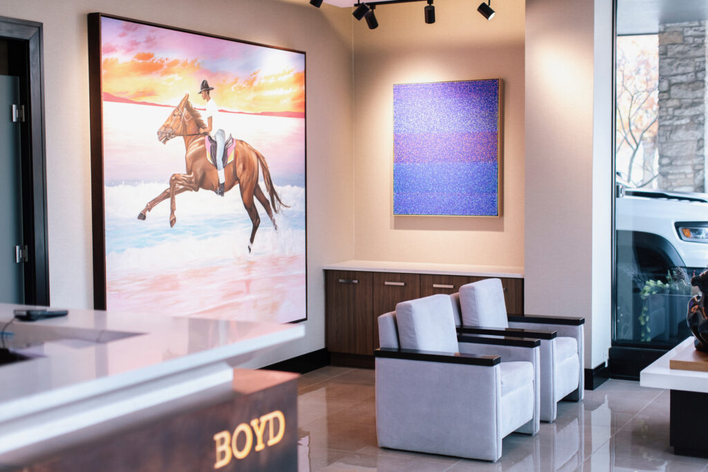 BOYD Med Spa reception area in Birmingham, Michigan with original fine art and modern decor